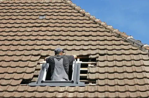 Pose de velux - Landelles-et-Coupigny